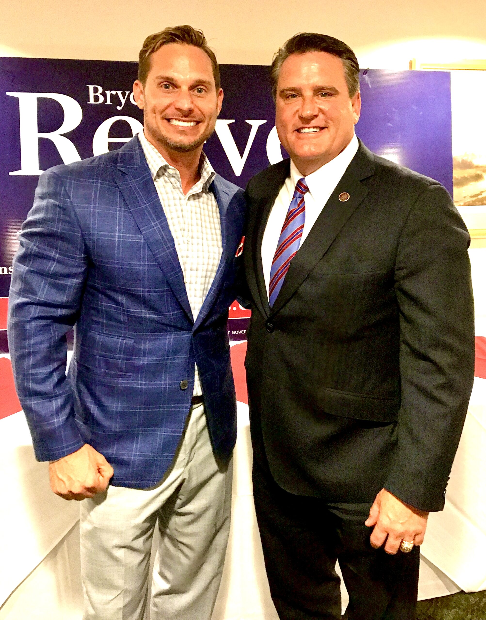 John Siver II in a suit with a friend