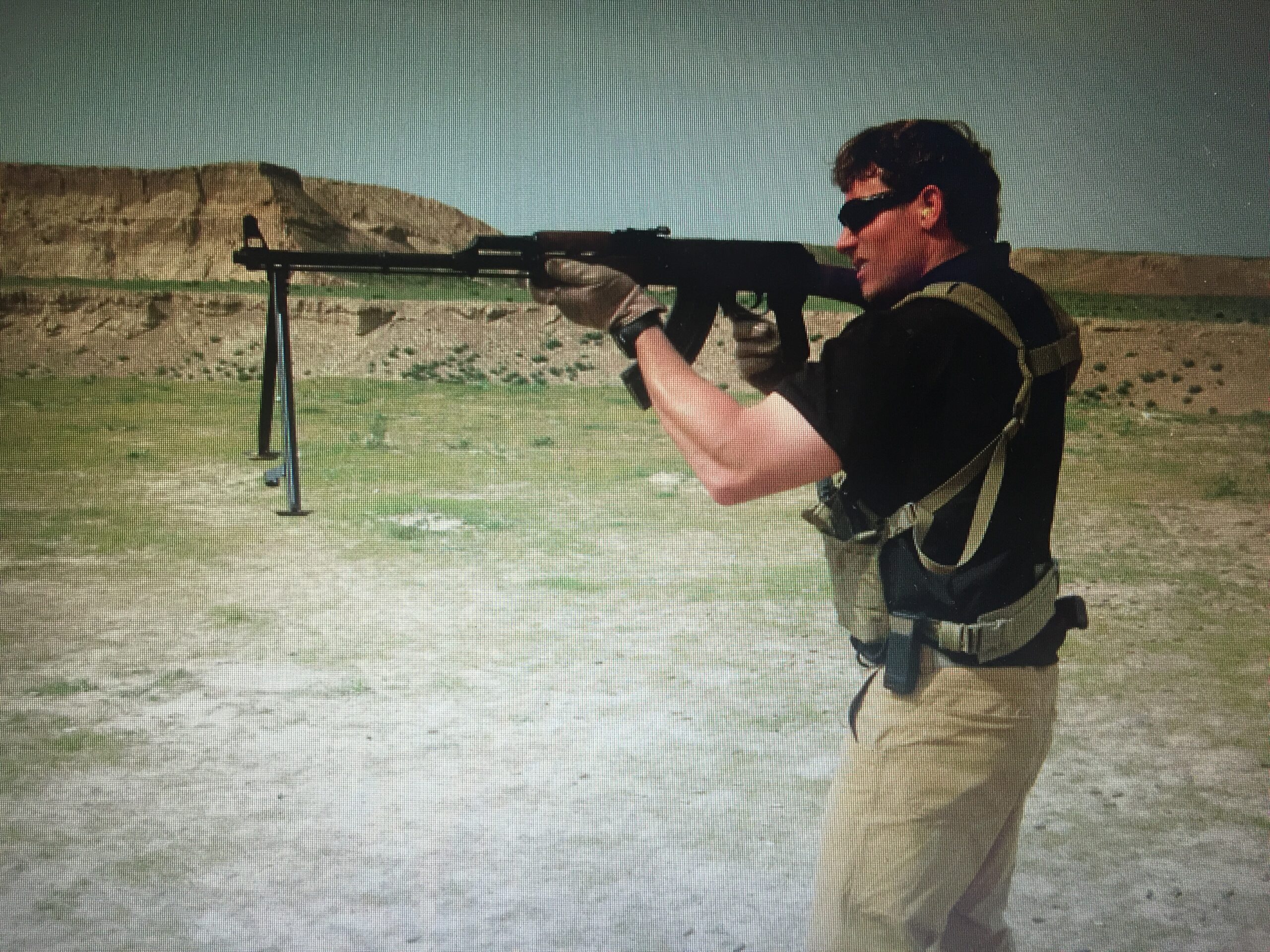 John Siver II with a light machine gun